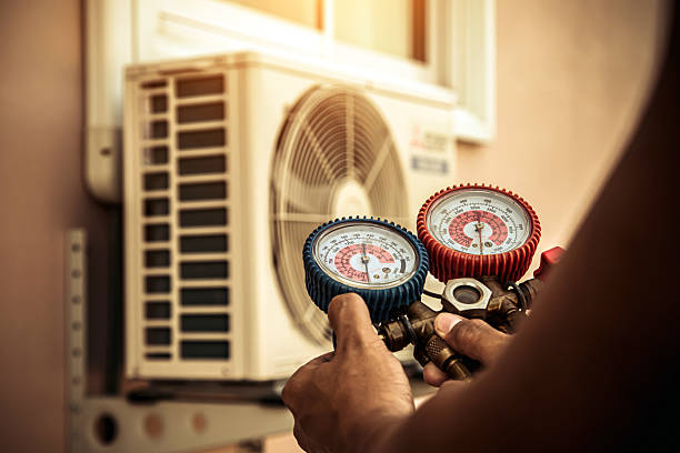 Professional Ac Installation technician working in Milton Village, MA